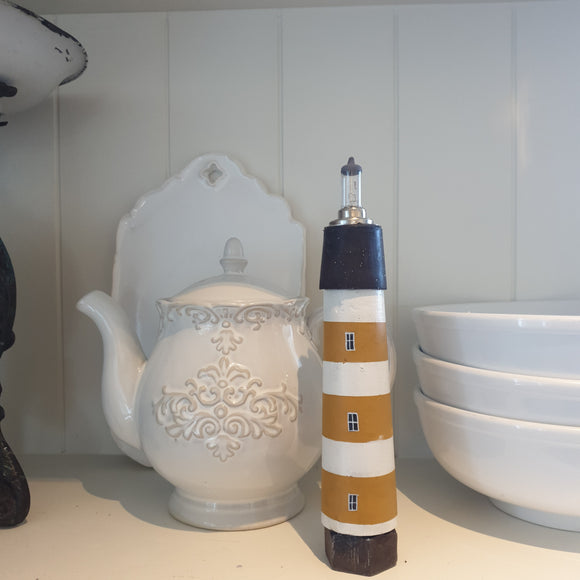 Tiny Wooden Lighthouse made from upcycled bedleg